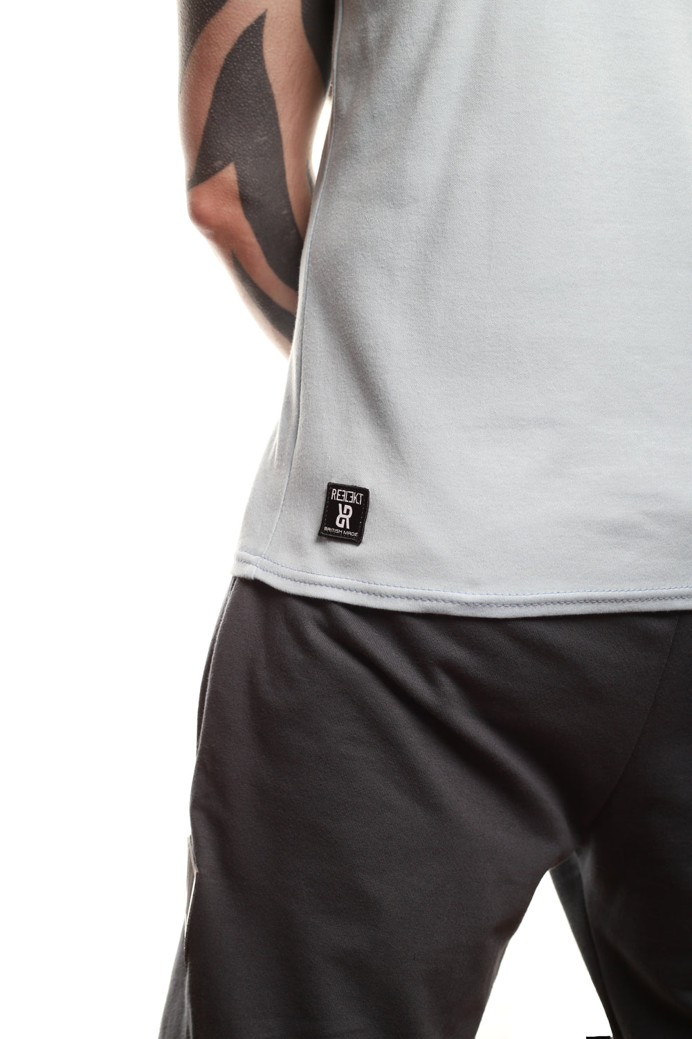 Insignia patch on back of Sky‑coloured REFLEKT Heritage T‑shirt.