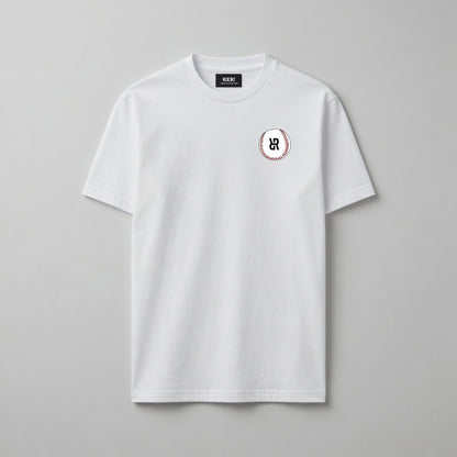 White t-shirt with a small baseball logo on a gray background