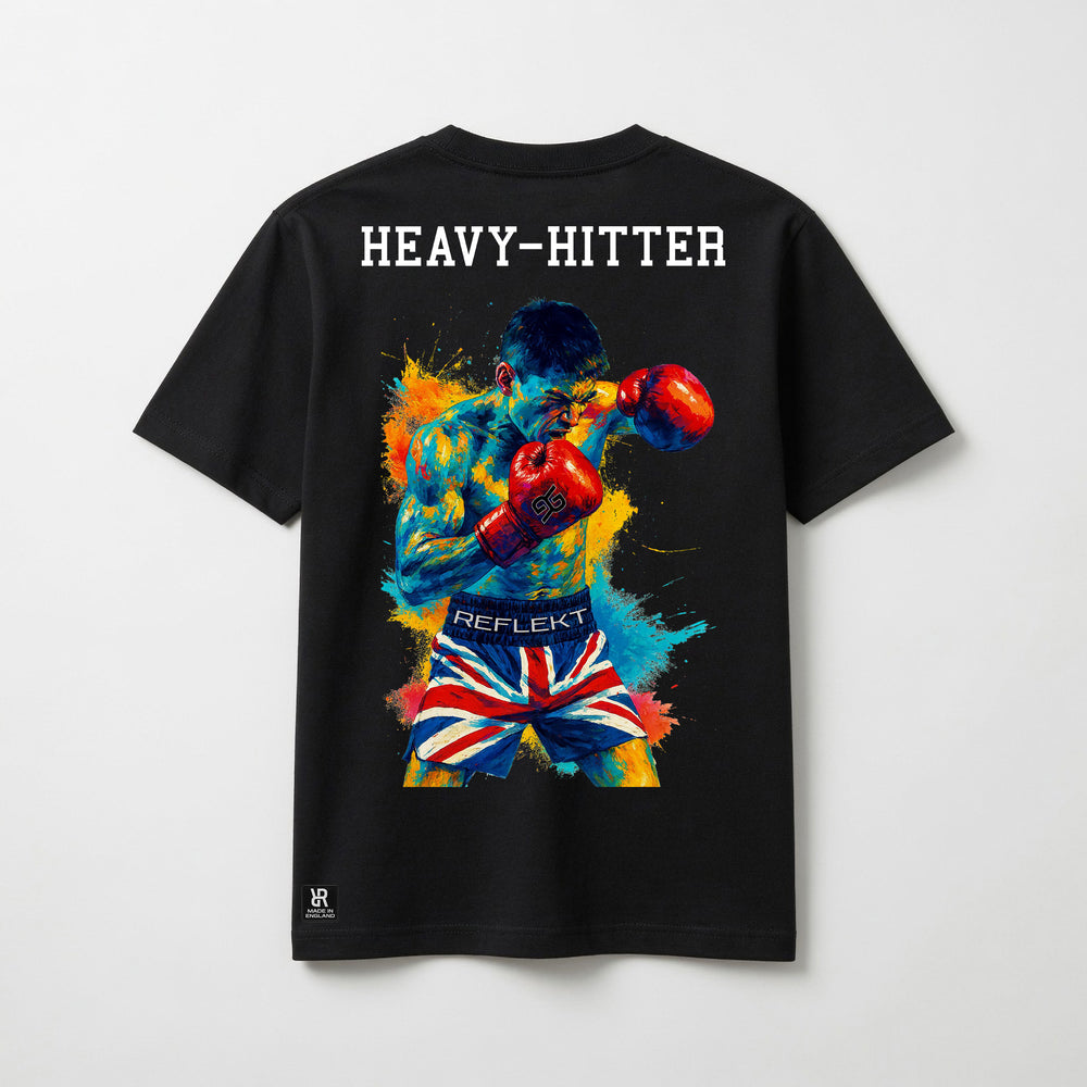Black t-shirt with a colorful boxing graphic and 'HEAVY-HITTER' text on the back, displayed against a light gray background.