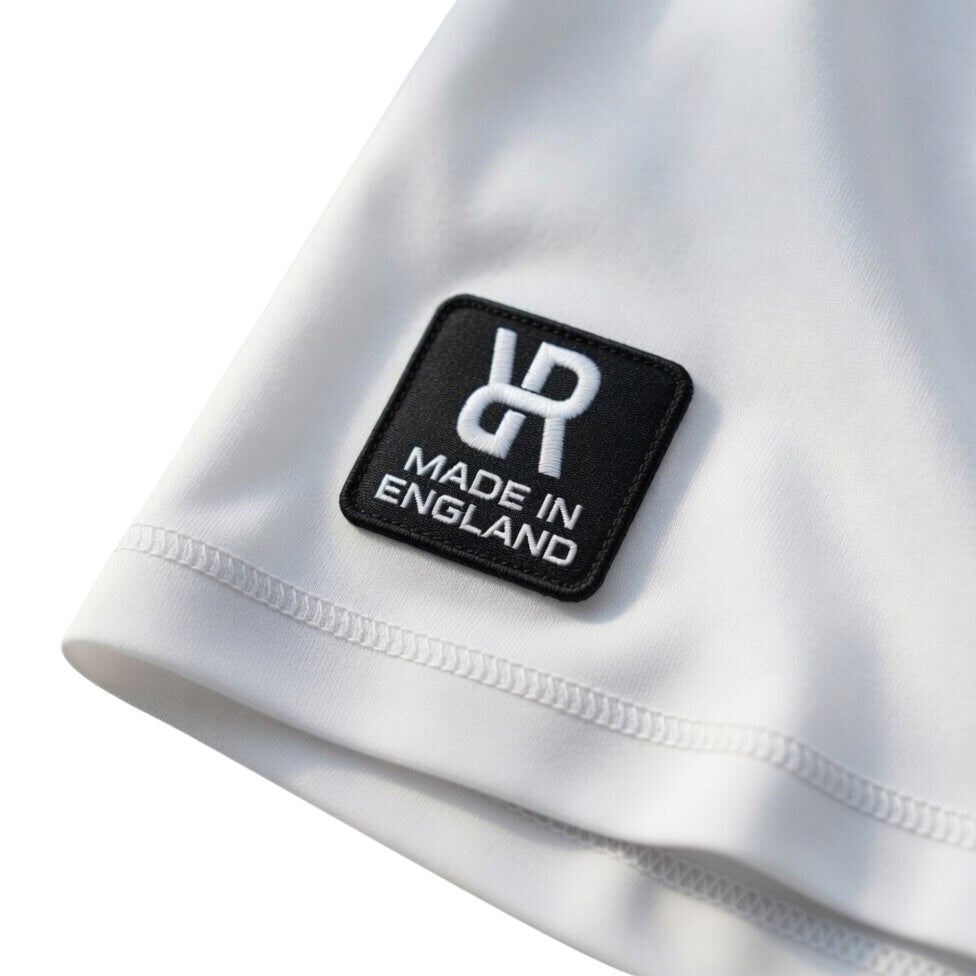 White fabric with a REFLEKT 'Made in England' label on a light gray background
