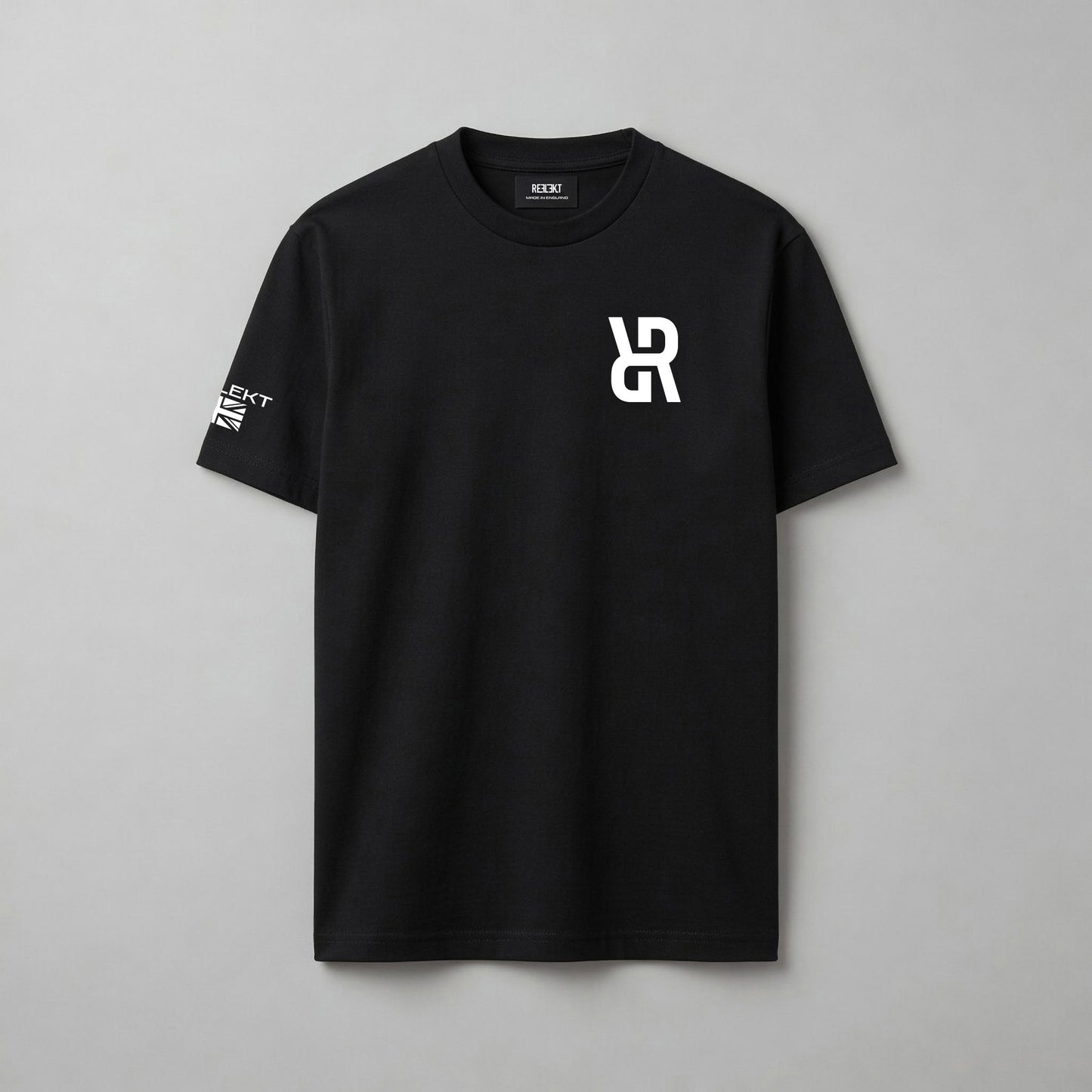 Black t-shirt with a white REFLEKT logo on a gray background