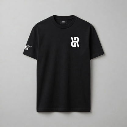 Black t-shirt with a white REFLEKT logo on a gray background