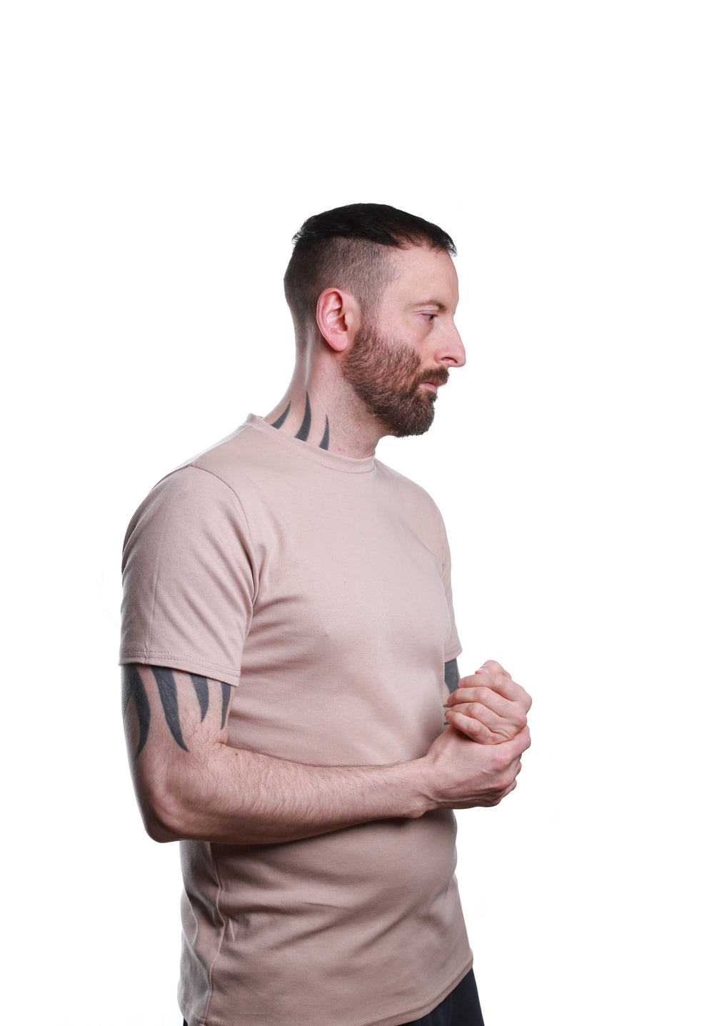 Side view of Stone‑coloured REFLEKT blank T‑shirt with classic crew neckline.