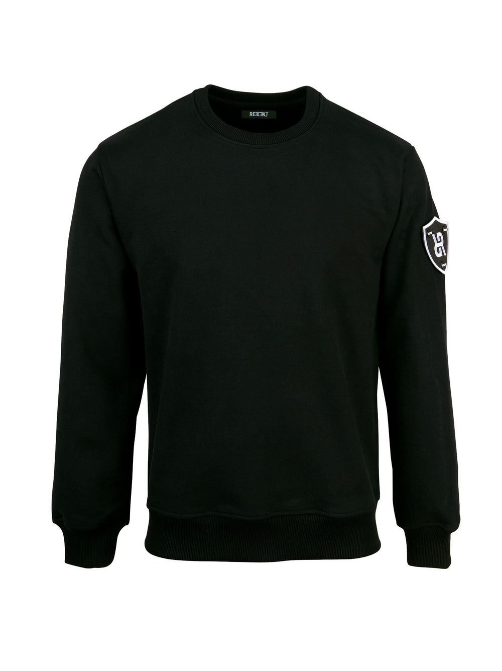 Black REFLEKT Legacy sweatshirt with shield logo patch on the left sleeve.