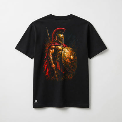 A black short-sleeve t-shirt with a large graphic print of a Spartan warrior holding a shield and spear on the back. The graphic features a red helmet plume and a red cape, with the warrior rendered in gold and bronze tones.